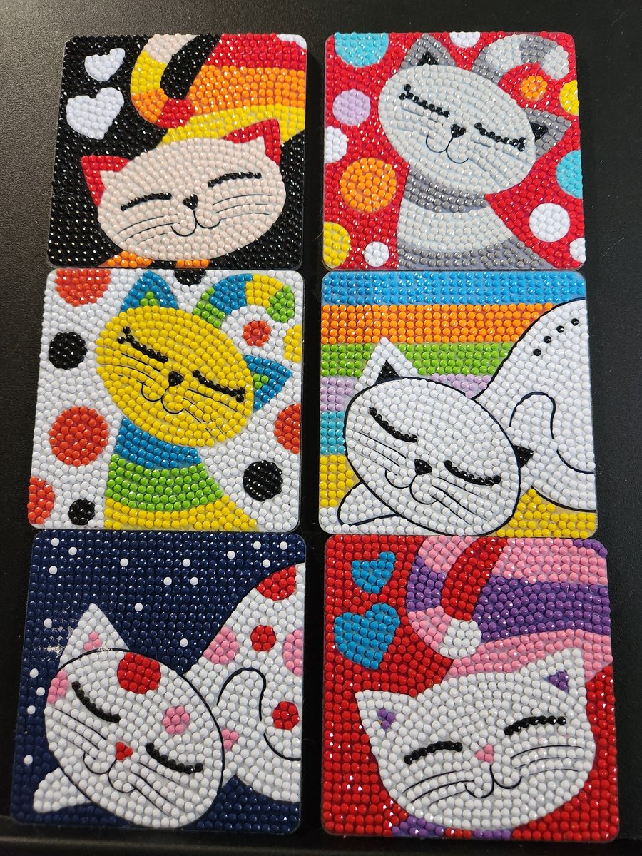 Rhoslyn's tweet photo. Colorful cat coasters https://t.co/awRL6PVwtn