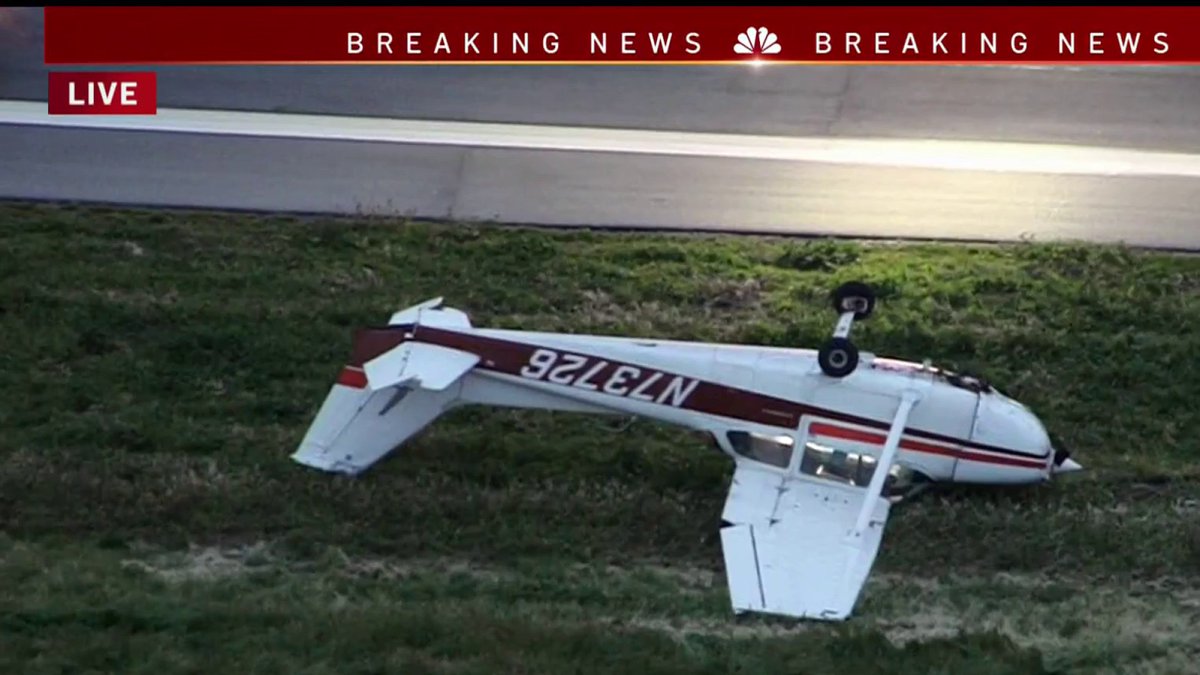 The upside down plane was located at the east end, and the pilot aboard