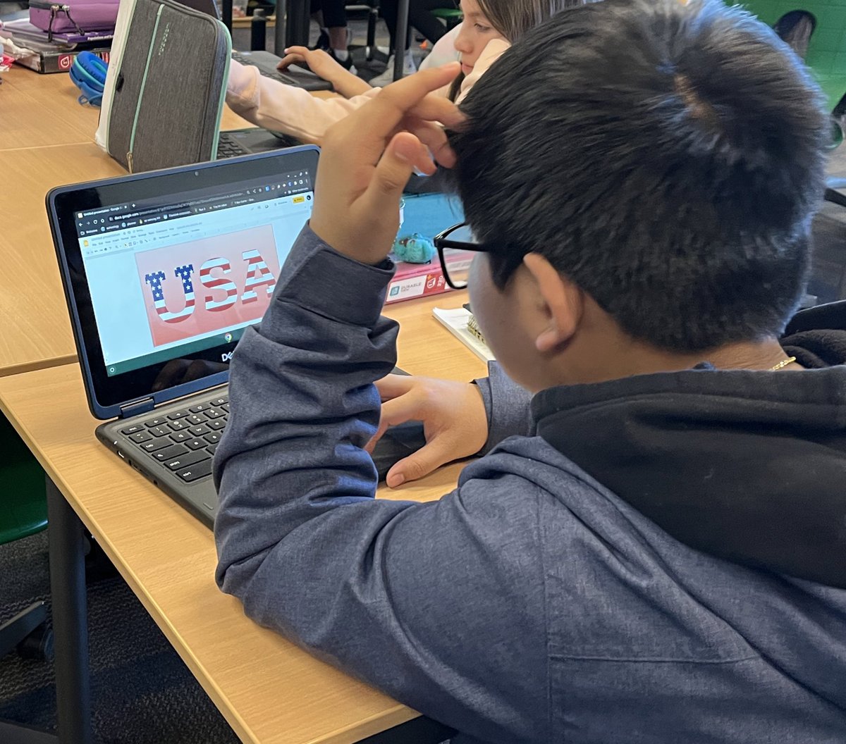 KMeyering's tweet photo. Working w/ @TechiePri to guide Ss through the creation of photo words in Dalzochio’s 6th grade classes @ Novi Meadows. Ss are researching different countries so we used USA as our example! 🇺🇸 Thanks @ericcurts for the awesome idea &amp; directions! #NoviEdTech #OakEdTech #NoviPride https://t.co/300Csd842j