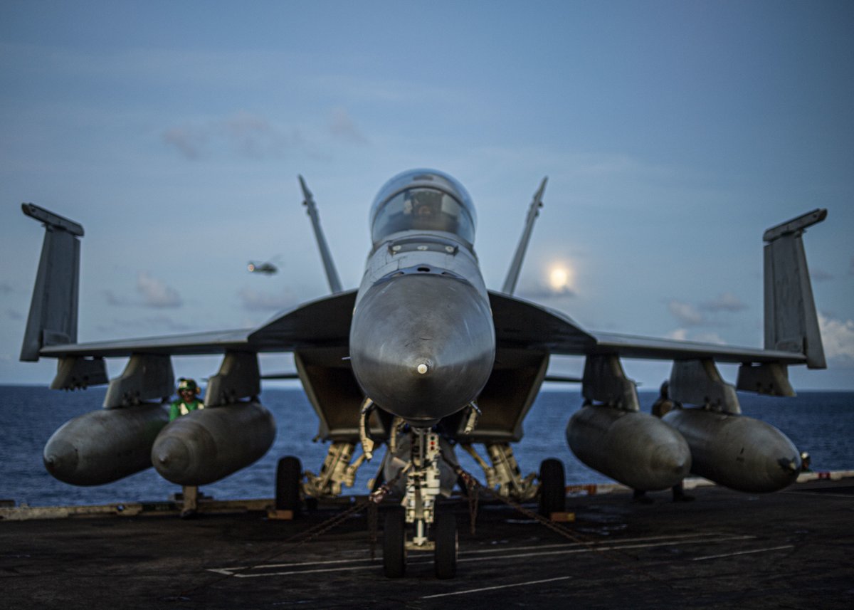 Hello beautiful.  

An F/A-18F Super Hornet from the “Fighting Redcocks” of Strike Fighter Squadron 22 prepares for flight operations on the flight deck of the aircraft carrier USS Nimitz from the <a href="/US7thFleet/">7th Fleet</a>.