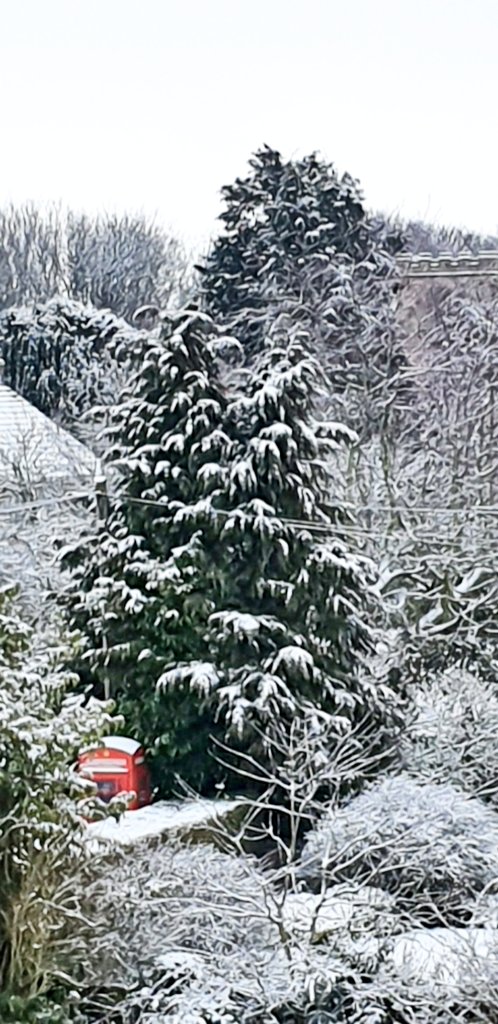 snapperchatta's tweet image. Hello from North Yorkshire. Magical. (May need a click.) #Snow #PhoneBox #Church #Yorkshire