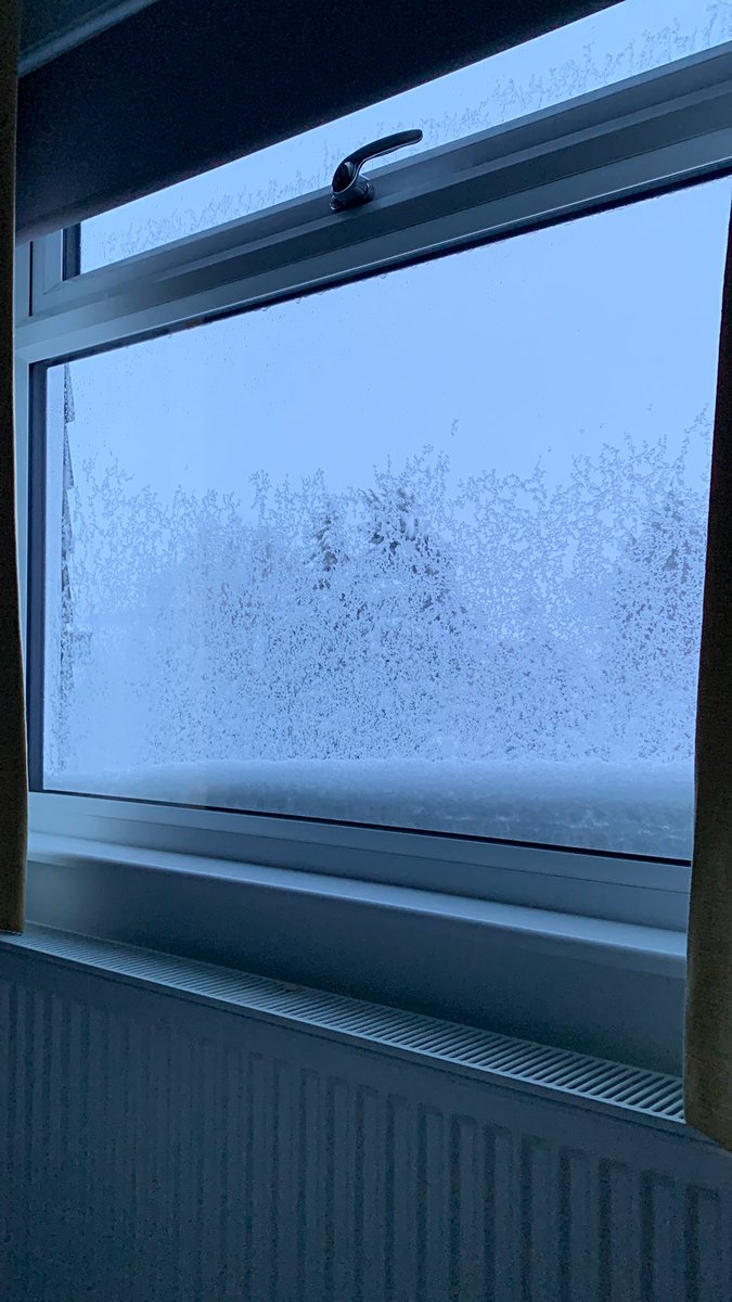 Calvinotis's tweet image. I’ve a feeling I’ll have to use the front door today. Direction of snow against my porch door. Bedroom window and view from same #HD9 #Holmfirth #snow
