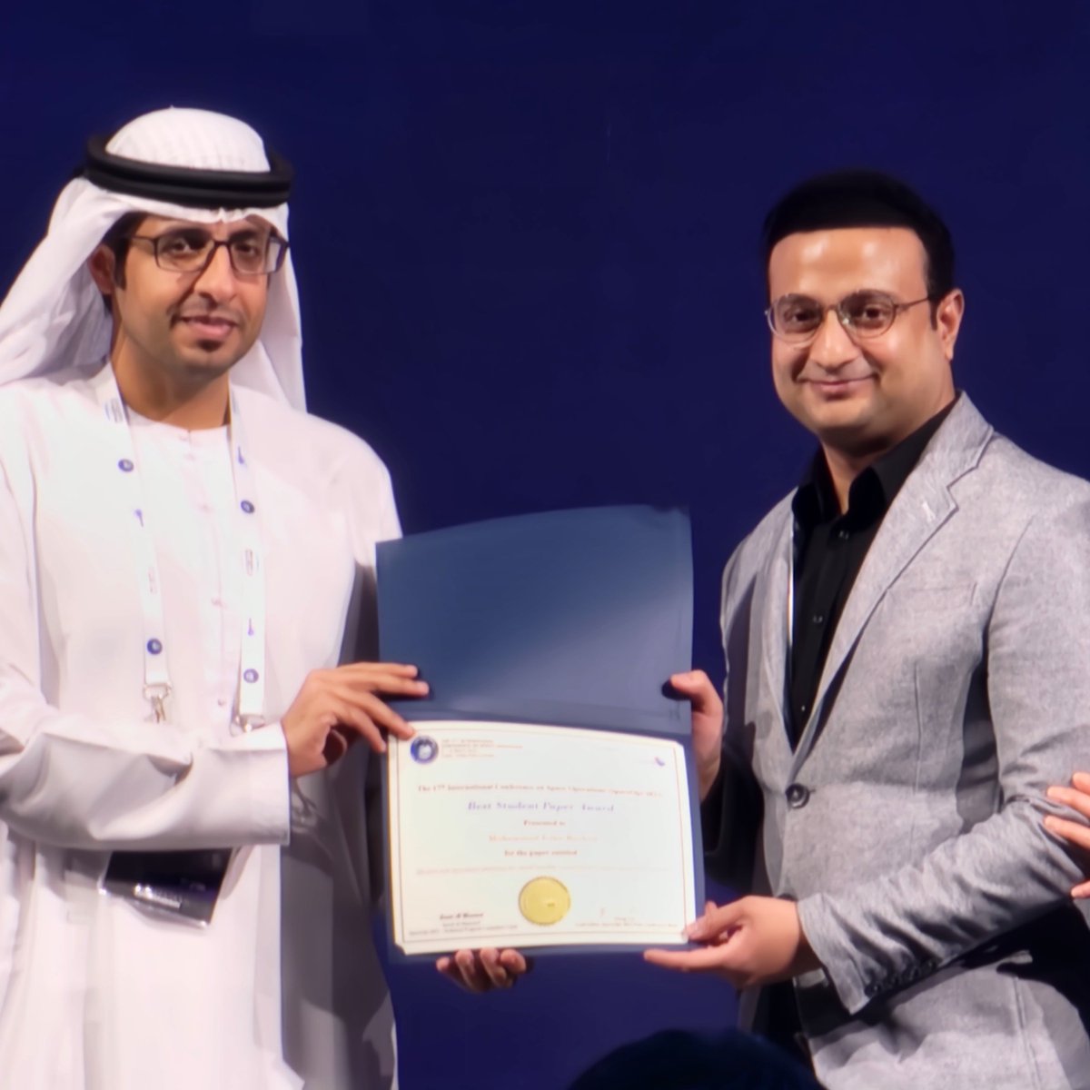 #SpaceOps2023 Awards 

Saeed Ali Mansouri, Technical Program Committee Chair presents the ‘Best Students Paper Award’ to Mohammed Irfan Rashed for his paper entitled ‘Mission and operations planning for small-satellite constellations using autonomous systems'.