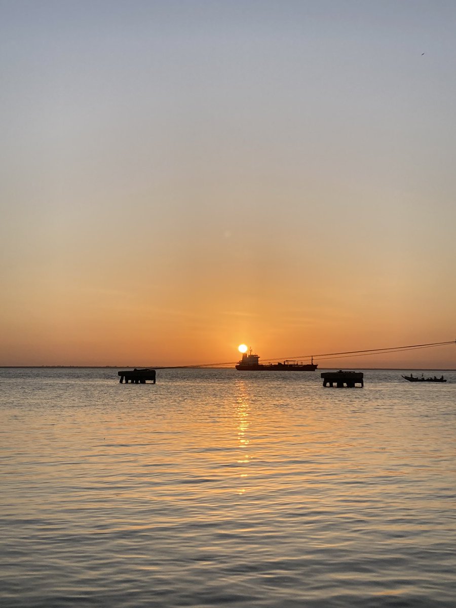 An early and unexpectedly enjoyable start to today watching the sun rise at Banjul ferry port. Visiting #mangroves later (hopefully)!