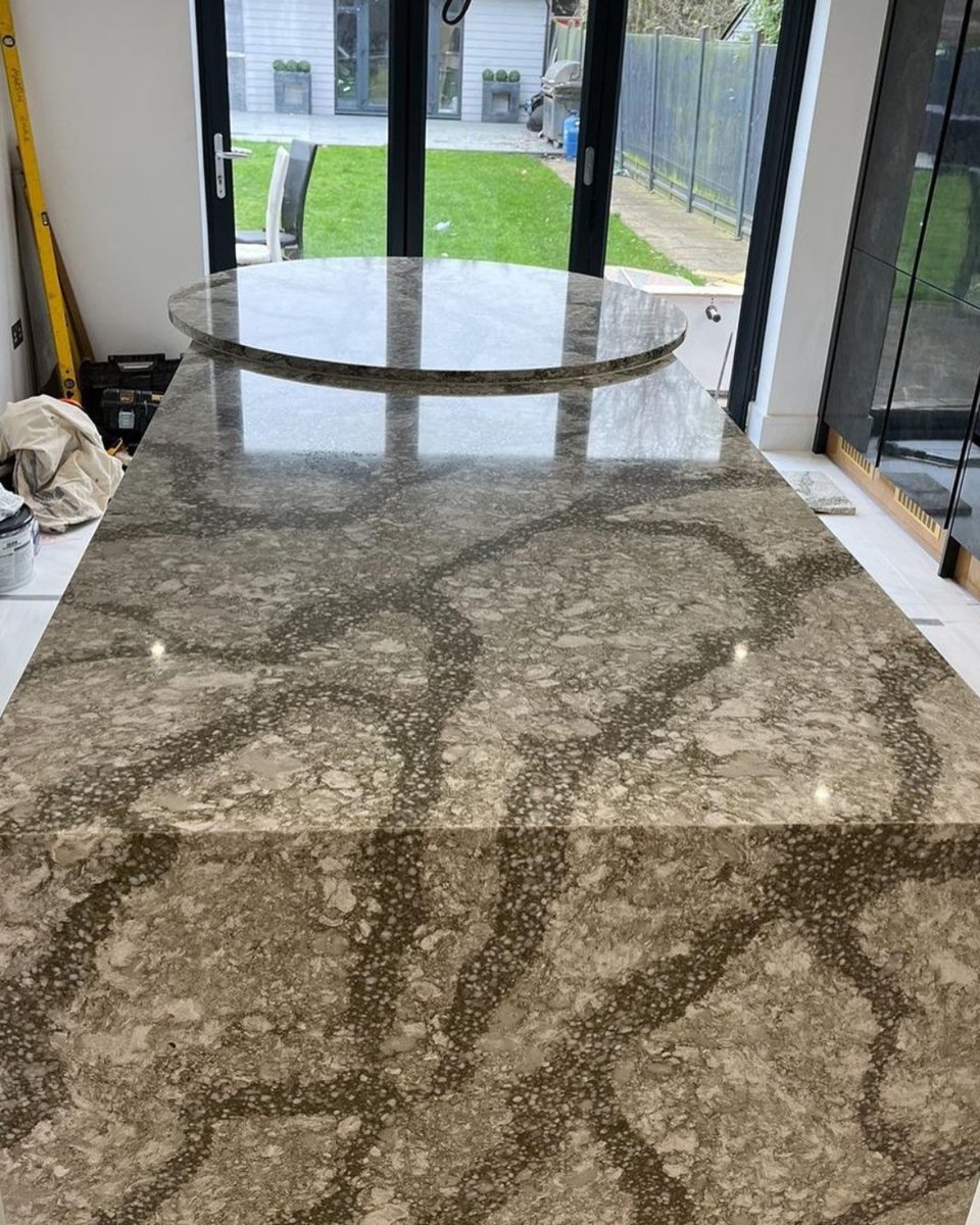 A kitchen island with a circular worktop at one end.  Cambria Beaumont quartz comes up trumps.  <a href="/SladeStone/">Slade</a> #mycambria 

#mycambria