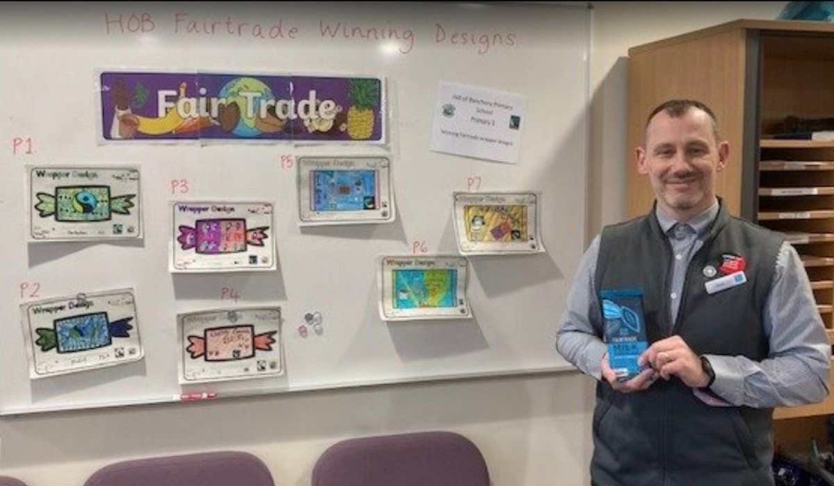 Wilsonpaulh's tweet photo. @hillofbanchory Fair Trade café served by primary three pupils. HOB Store Manager Alan Porter presented winning Fair Trade chocolate bar designs to pupils to celebrate #FairtradeFortnight https://t.co/luOHKRWDPe