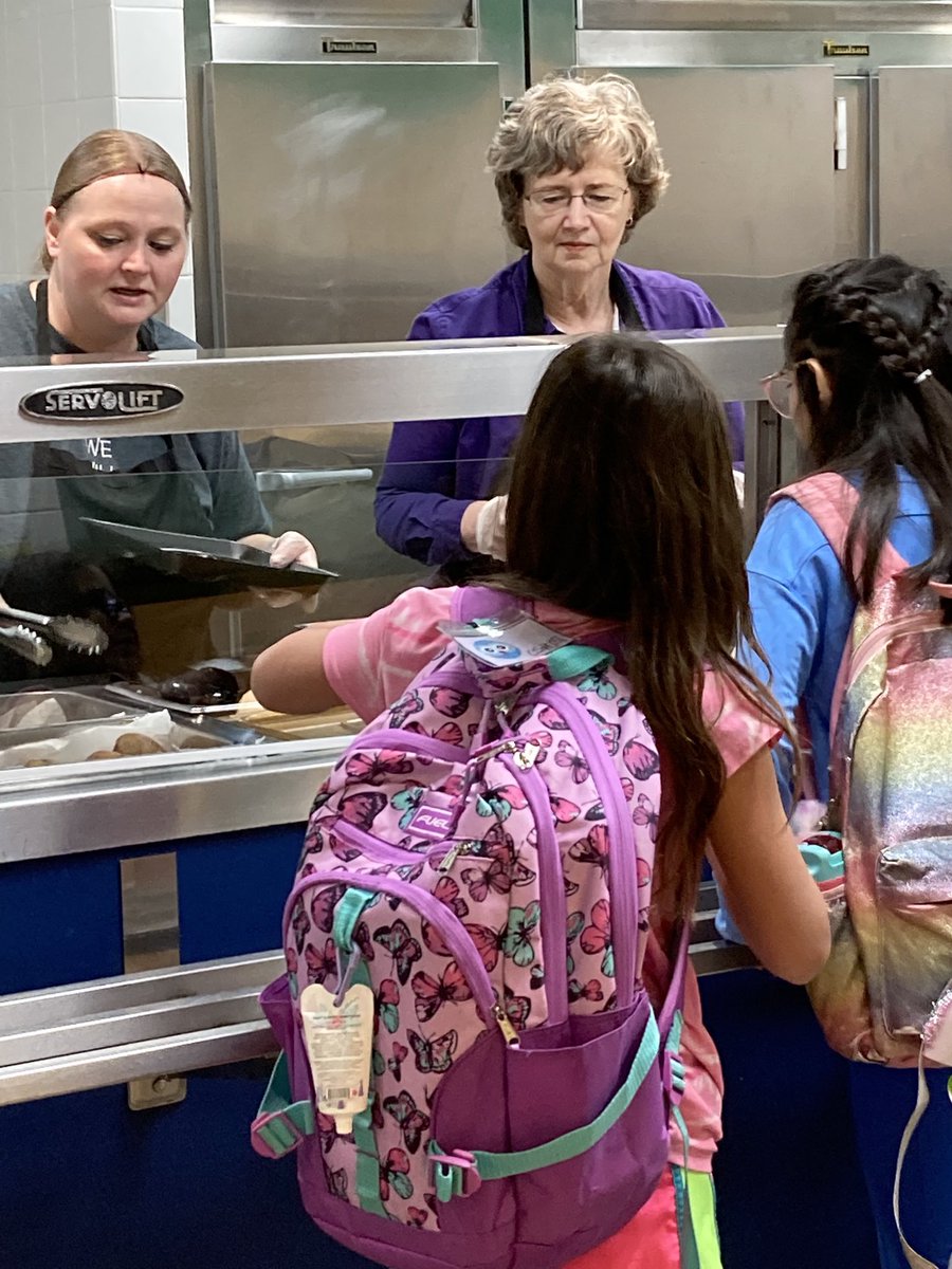 ladybug_tech's tweet photo. Mrs. Novak helping serve our students at FSH Elementary School Breakfast Week. https://t.co/kojg1WELGL
