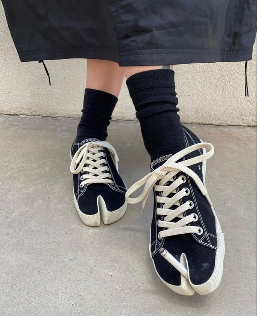 tons_pgh's tweet photo. Check out the latest addition to our collection – the Maison Margiela #tabisneakers ! Originally launched in 1989, the Tabi has become an iconic signature of the Maison Margiela. These sneakers are available in both sizes, so everyone can rock this avant-garde style.  #tabishoes https://t.co/VoKfDqpnVu