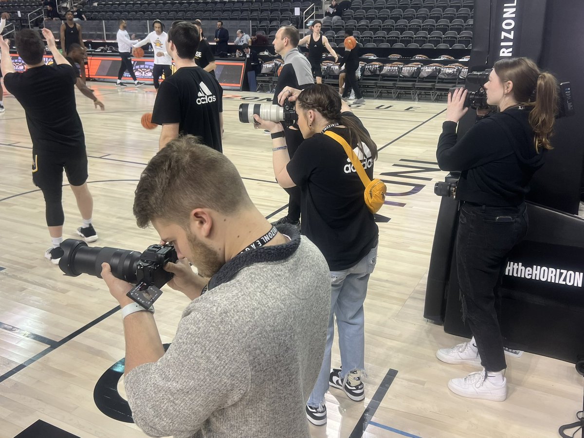 “Media 101” <a href="/nku_informatics/">NKU Informatics</a> EMB students focused before the <a href="/HorizonLeague/">Horizon League</a> championship game. <a href="/tmart012/">Travis Martin</a> with digital cinema camera, <a href="/violet_lewis9/">Violet Lewis</a> still camera, <a href="/gracieholland0/">Grace Holland</a> ENG high-def broadcast camera. Recording <a href="/NKUNorseMBB/">NKU Men's Basketball 🏀</a> championship. <a href="/nkuedu/">Northern Kentucky University</a> <a href="/NKUNorse/">Northern Kentucky Athletics</a> #NorseUp