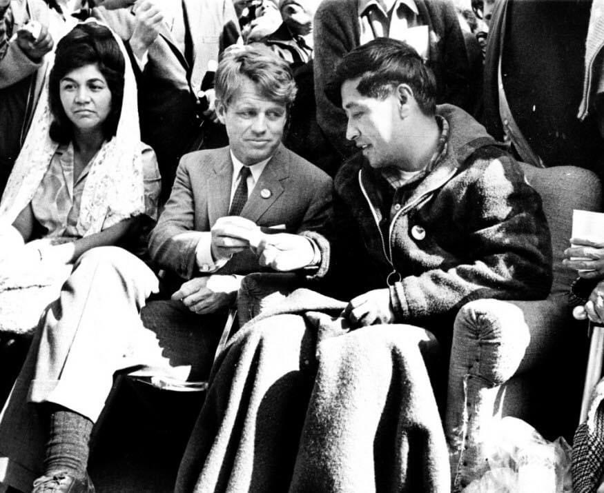 I post this every year....it’s an iconic image from my youth, taken 55 years ago, at the moment labor activist Cesar Chavez ended a 25 day fast with a piece of communion bread, given to him by then Sen Robert Kennedy. One week later, RFK would enter the 1968 Presidential race.