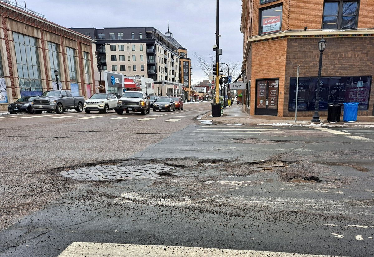 I hate potholes, but I love looking at history! #Streetcar rails & cobblestone streets emerge at Hennepin Ave/Lake St in #UptownMpls. So awesome! 🚞  @CityMinneapolis