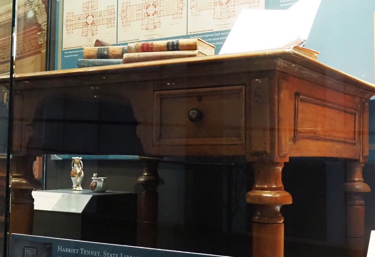 MIStateCapitol's tweet photo. Artifacts are a tangible link to the people who have made history in #mistatecapitol. This 1870’s table in Heritage Hall came from the State Library, which was managed by Harriet Tenney, the first woman to head a state department in Michigan. #womenshistorymonth #LibraryofMich https://t.co/YgiJumZSgn