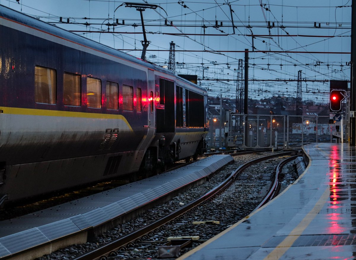 Dusk on a damp day in Brussels. The train shown has its DC pantograph (current collector) raised. At the start of the high-speed line, it will be lowered and the AC one used for the rest of the journey to London. All done on the move. A great bit of design and engineering!