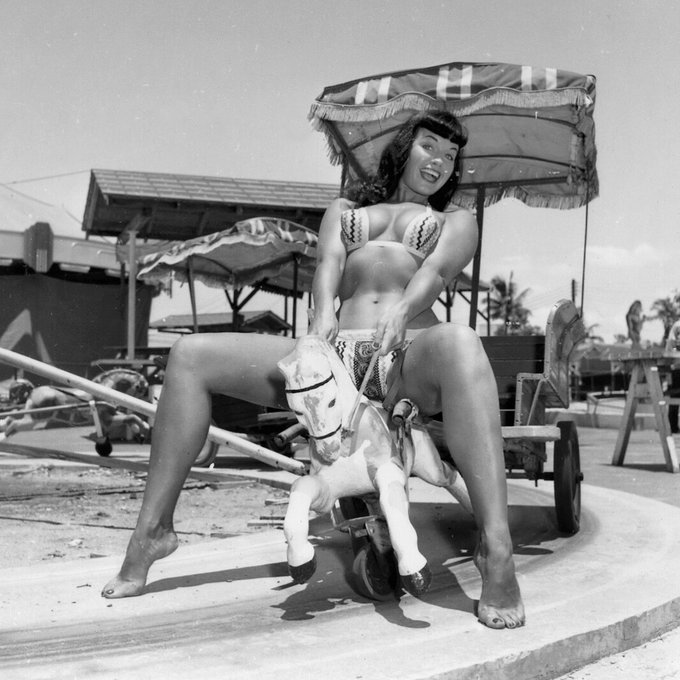 ☀️ Giddy-up horsey, it&rsquo;s quittin&rsquo; time! 🎠 Happy Friday, Bettie babes and beaus! 💞  ~Pic by Bunny Yeager~  #pinup<a href="/tag/pinup"class="tags"><span>#pinup</span></a><a href="/tag/bettiepage"class="tags"><span>#bettiepage</span></a><a href="/tag/bunnyyeager"class="tags"><span>#bunnyyeager</span></a><a href="/tag/pinupgirl"class="tags"><span>#pinupgirl</span></a><a href="/tag/retrostyle"class="tags"><span>#retrostyle</span></a>