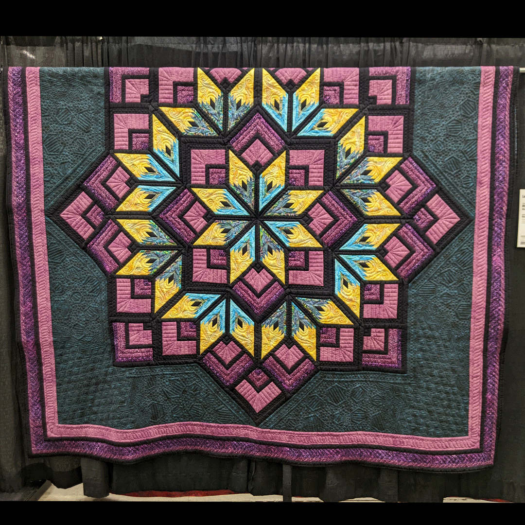 WIQuiltShow's tweet photo. "Lotus," created by Rita Straubhaar of Webster, New York and quilted by Kim Werth, entered in the 2022 Quilt Contest, Machine Quilted Bed Size - Pieced category.
Pattern/design source: "Stardust" by Derrick Lockwood
#WisconsinQuiltShow https://t.co/4wXezO5l9h