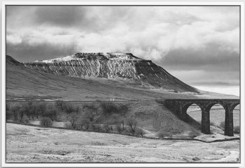 Fine art prints and framed canvas art prints from an original black and white photograph of Ribblehead Viaduct with Ingleborough by Stephen Knowles Choice of sizes Choice of frame colour £22 - £193 Buy at newartgallery.co.uk