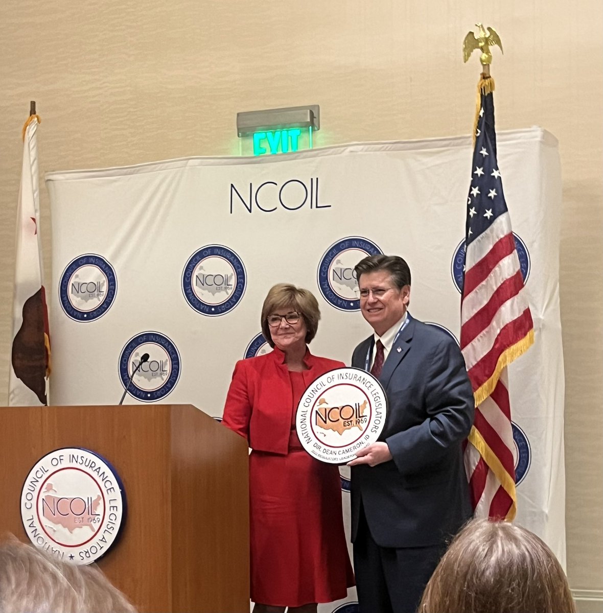AR Rep. Deborah Ferguson, DDS, NCOIL President, presents ID Insurance Dir. &amp; <a href="/naic/">National Association of Insurance Commissioners</a> Immediate Past President Dean Cameron with the NCOIL Regulatory Leadership Award, honoring all he has done to advance insurance public policy.