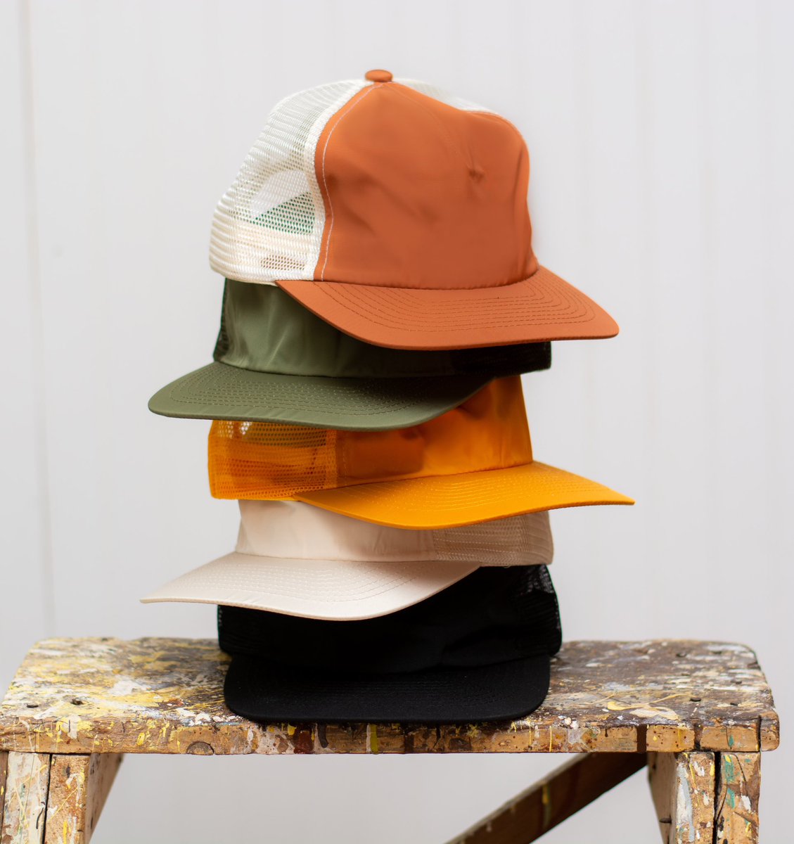 Not your average Trucker hat. New Nylon Field Trip Trucker hats available in +5 Colors. #blankhats #weldmfg #customhats