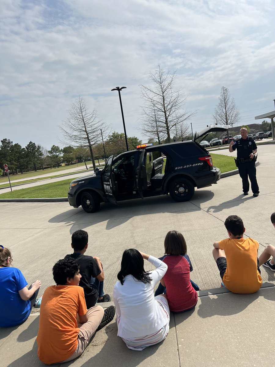 Once again, Officer Loter with @CFISDPDChief , is the hero of the day for @salyardsms Life Skills class! Thanks for showing us your cool car and teaching us all the police things! We appreciate you! 👮‍♀️🚓🚔🚨🐅🐯