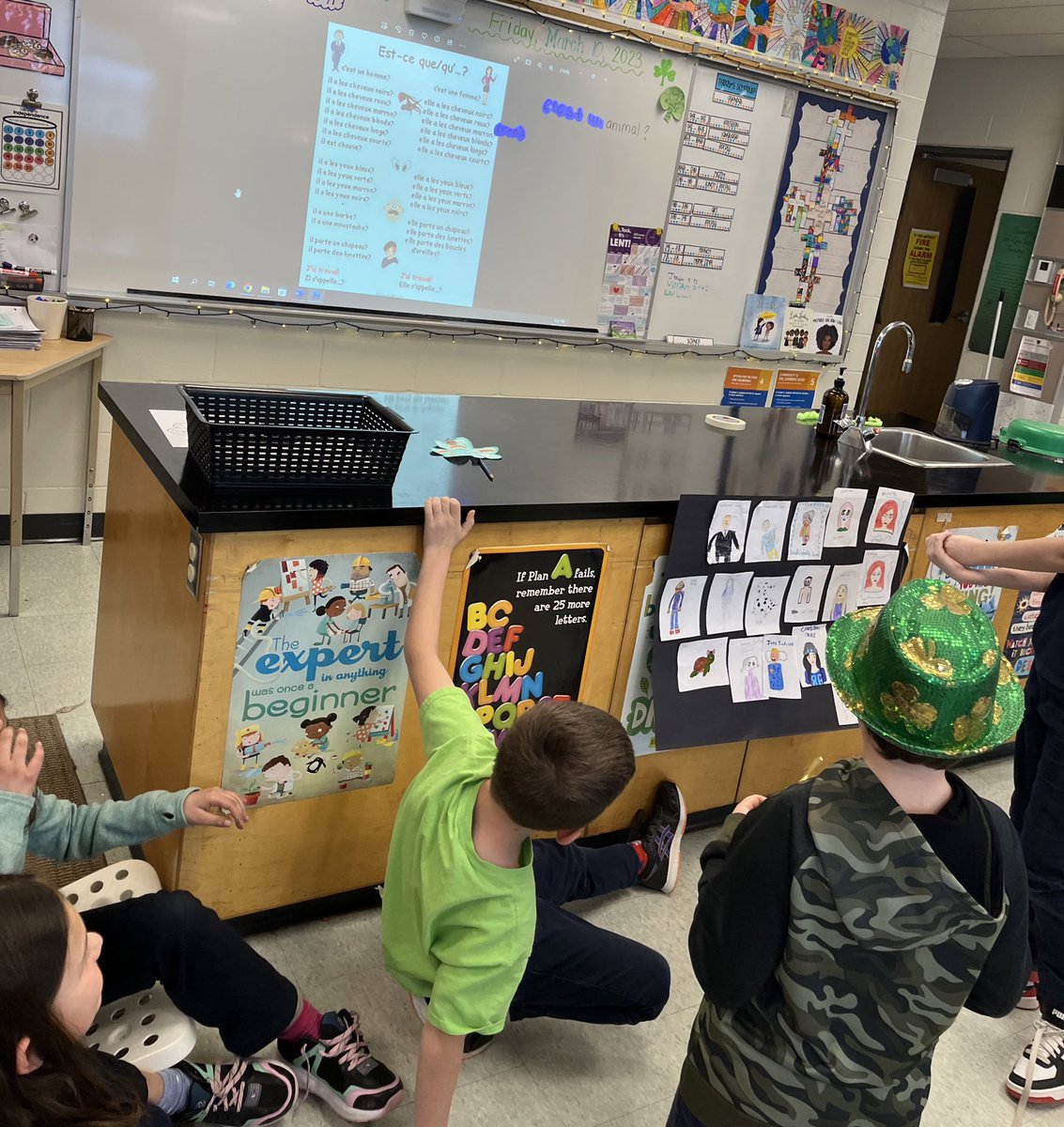 MsPimentel1's tweet photo. Today we played “qui est-ce” with a fictional family we created together. Students were so excited to see their drawings and play- what a great way to start march break!  #frenchisfun @HolyRosaryM @HCDSBFrench #Unstoppable @Ms_Gustin1 https://t.co/JU6AvxUYIA