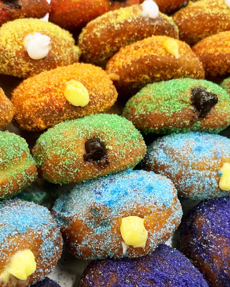 Eat the rainbow 🌈! Our Rainbow Malasadas are filled with Custard, Haupia & Dobash but are only here for a limited time! 😋👑🙌#eattherainbow #rainbow #malasadas #custard #haupia #dobash #aloha #hawaiian #hawaiianfood #onolicious #sweets #donuts #doughnuts #treats #TreatYourself