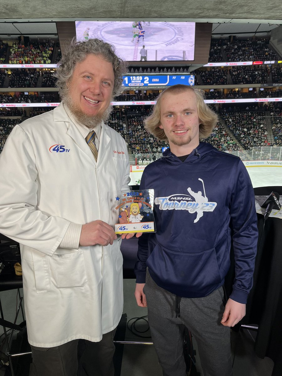 DrChuckElls's tweet image. Official presentation to @Caleblind16 of the 2023 Dr. Chuck Ells Hockey Hair Award. Even more #epic in person.

I present to you:
“Male Pattern Baldness With Flow” 
#45tvhockeyhaircontest #45tvhockeyhairaward #tourneyson45tv #Tourney23 #hockeyhair @kstc45 @alexboyshockey