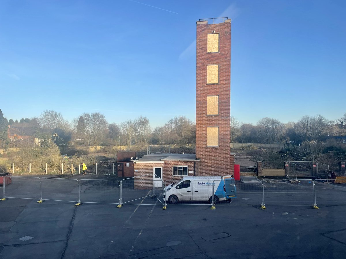 HWFireJHolder's tweet photo. Now you see it, now you don’t. Watch https://t.co/NXKCvOwlOb as work progresses at Redditch’s brand new combined police and fire station with the demolition of the old training tower. https://t.co/KN0fYeupSz
