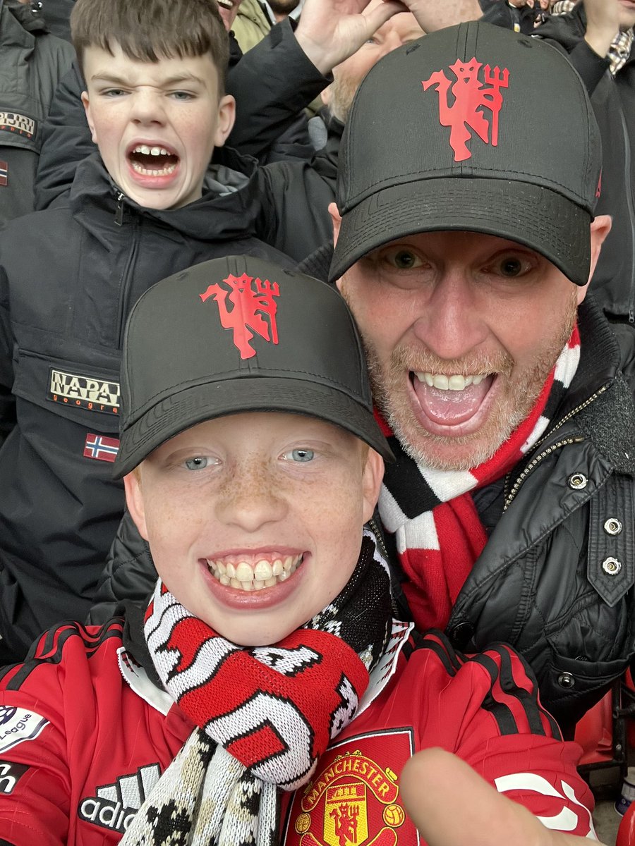 GrantRBFreeman's tweet photo. When that second goal went in to take all 3pts vs the noisy neighbors in January ‘23 - the Stretford end was bouncing. What a first match for my son 🔴⚪️⚫️ #MUFC #passion #MyPLMorning https://t.co/6WSqqegmQd