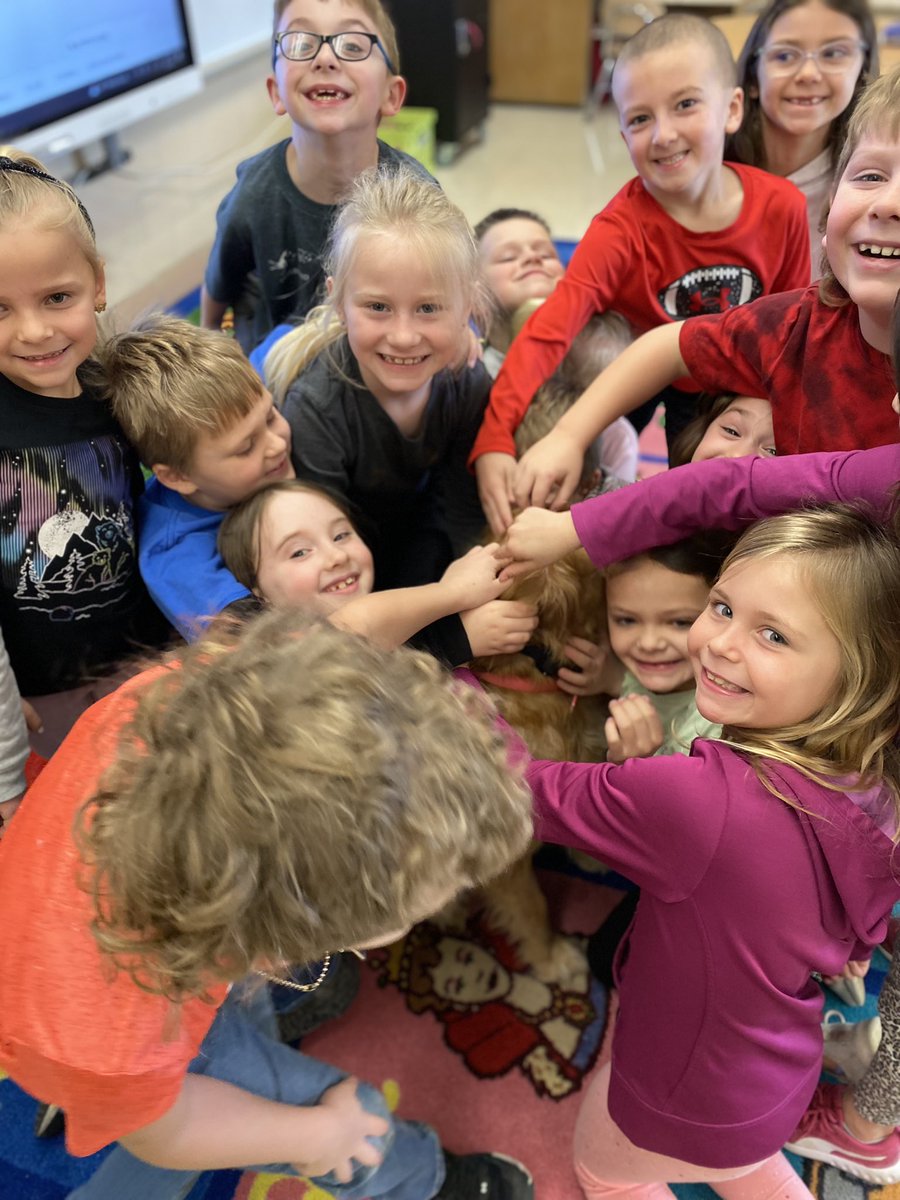 RCRockets's tweet photo. The students just love Dixie, our school therapy dog! Dixie’s job isn’t too “ruff”… she gets lots of pets and loving every day! (She’s in the middle of this big Dixie hug!) https://t.co/weJNEZ3Zun