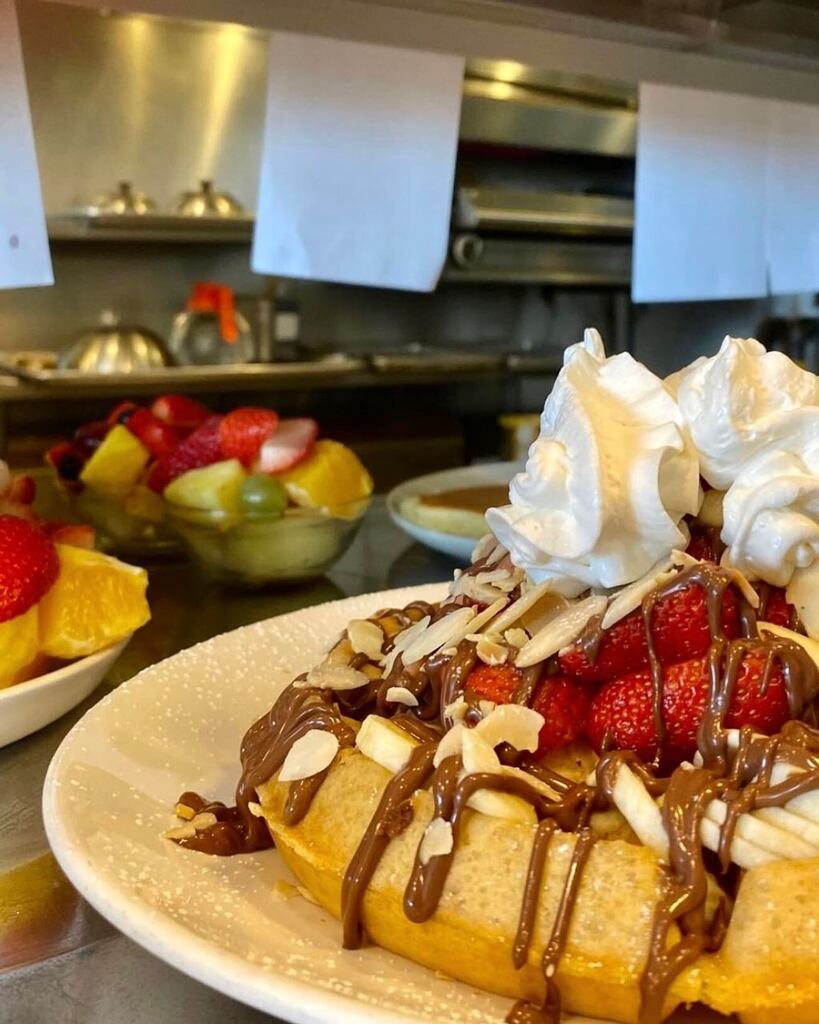 Indulge in a breakfast treat like no other at Sunny Morning! Our Sweet Dream Nutella waffle is the perfect way to start your day off right. Served warm and fresh, topped with a delicious combination of ripe bananas, juicy strawberries, and toasted almond… instagr.am/p/CppqldpucFT/
