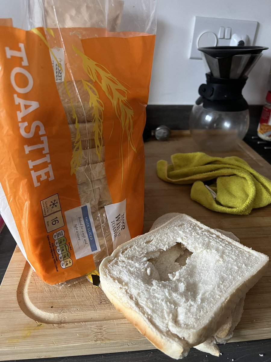 What’s happened here?!?!
<a href="/Tesco/">Tesco</a> #HolyBread 
Straight out the bag..
3 slices with holes straight through em? #Aliens