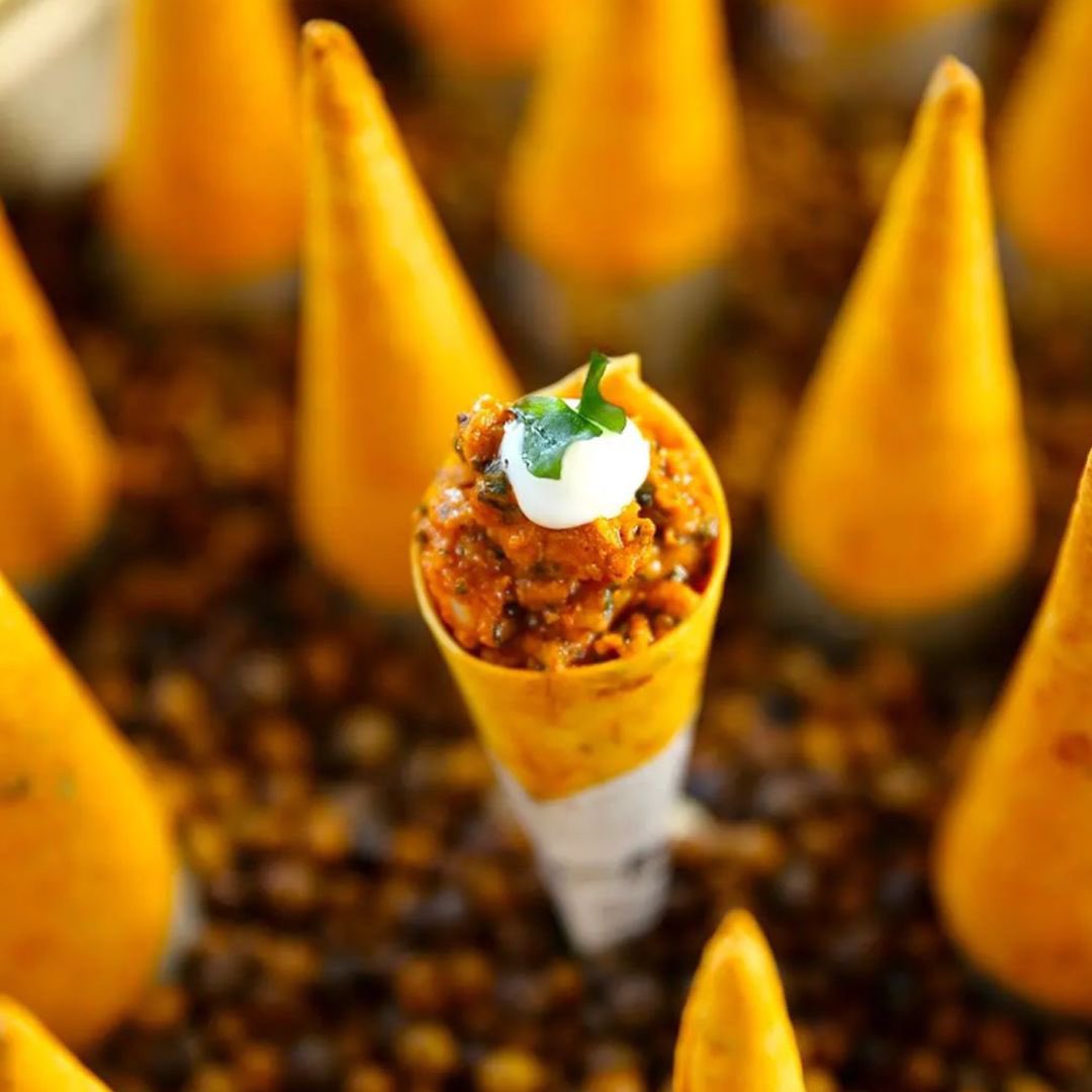 our cornets are one of the most photographed dishes at #indianaccentnyc. over the years, our chefs experimented with different fillings and its current avatar on the dinner menu features smoked eggplant bharta and goat cheese mousse

#inventiveindian #newyork #cornets