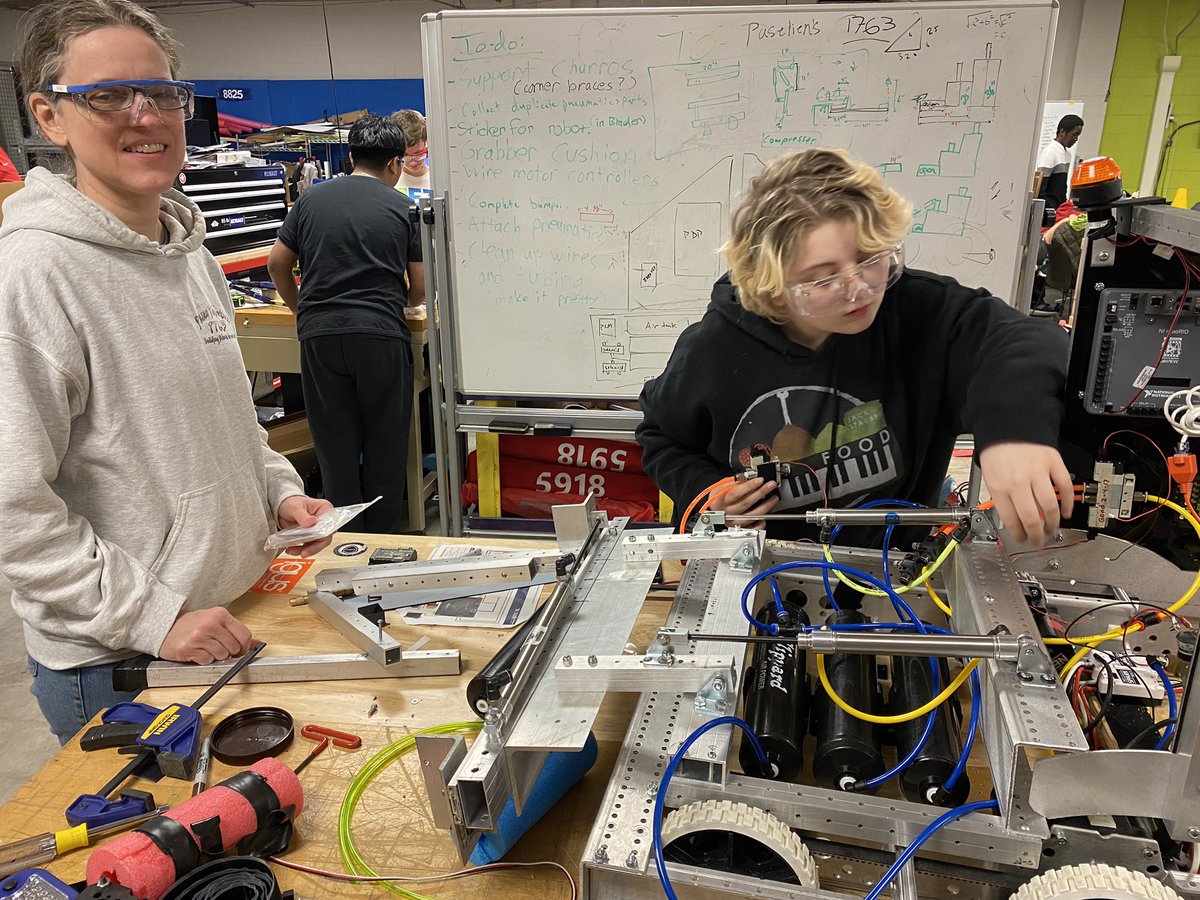 STEMKC's tweet photo. Mad hustle for final preparations heading toward @FRCTeams Heartland Regional event starting Thursday!  3 of the 4 #KCEZ teams will be competing!  @kcpublicschools @Tigerbytes1775 @Paseliens_1763 &amp; Central Academy of Excellence.  @CristoReyKC competes the following weekend. https://t.co/wGXHkJyQqX