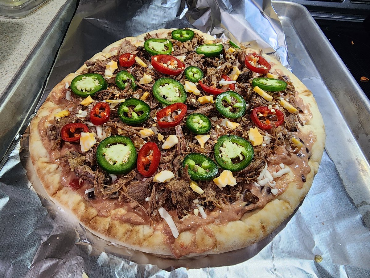 thespicygnome's tweet photo. Pulled beef Mexican pizza night! Topped with #LIV and #DragonsTears https://t.co/FZwxYwW5ts