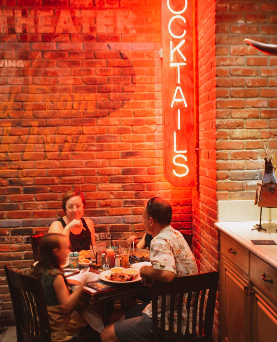 Stay out of the rain and claim a cozy spot at Gus's! Warm up with a BBQ combo plate and a cocktail or two. 🍖🥃🔥