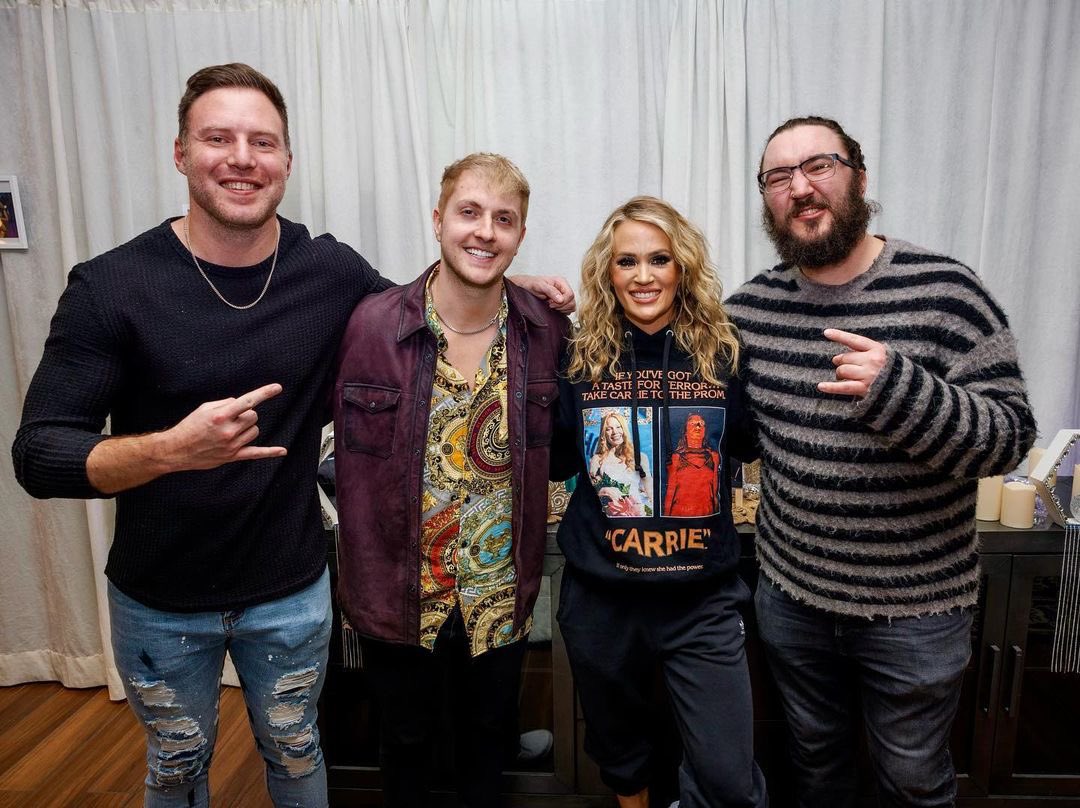 carrieunderwood's tweet photo. I was so excited to have the guys from @IPrevailBand at the show last night in Michigan!!! I tried to play it cool and not fangirl too much! 😬 Super great guys!!! I’m hoping I get to catch one of their shows this year!!! #IPrevail https://t.co/XZFhaEI2Rv