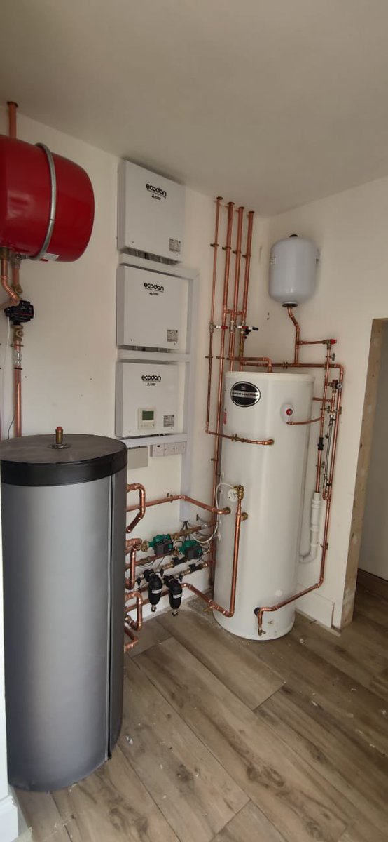 Neat ASHP plant room by EnergyMyWay