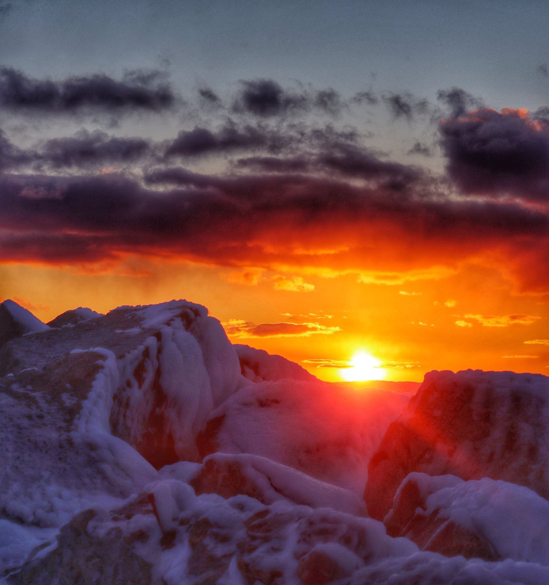 Icy rocks that look like cinnamon buns with icing on top. #bonavista #ShareYourWeather
