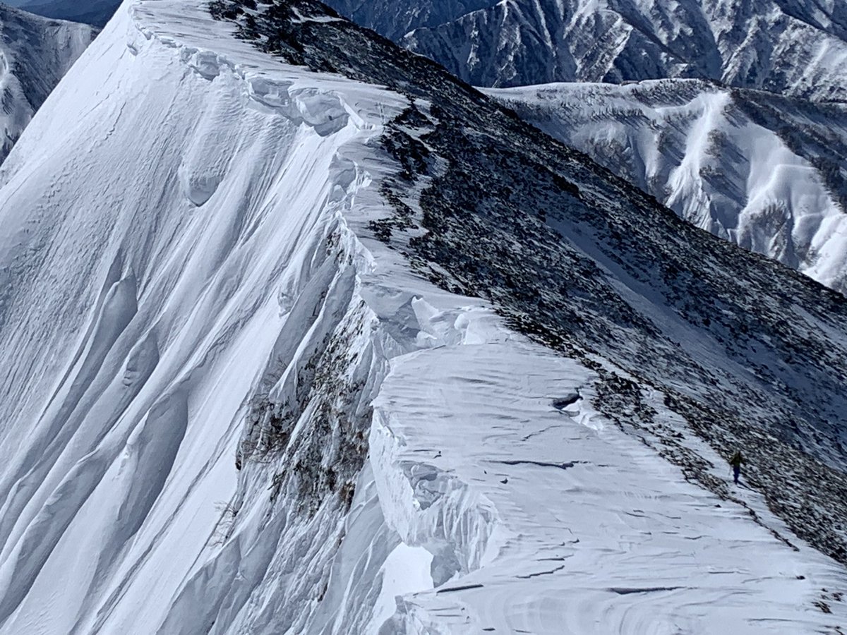 FPBassetti's tweet photo. Yesterday’s supremely satisfying ski descent of Kashimayari - 鹿島槍ヶ岳 (aka Big Boss). A wind ravaged ridge line with bus-sized cornices, spooky wind slab on our preferred ski line and tight gullies leading to the valley below made for an intimidating day in the mountains. ☑️ https://t.co/GPteMiqelY