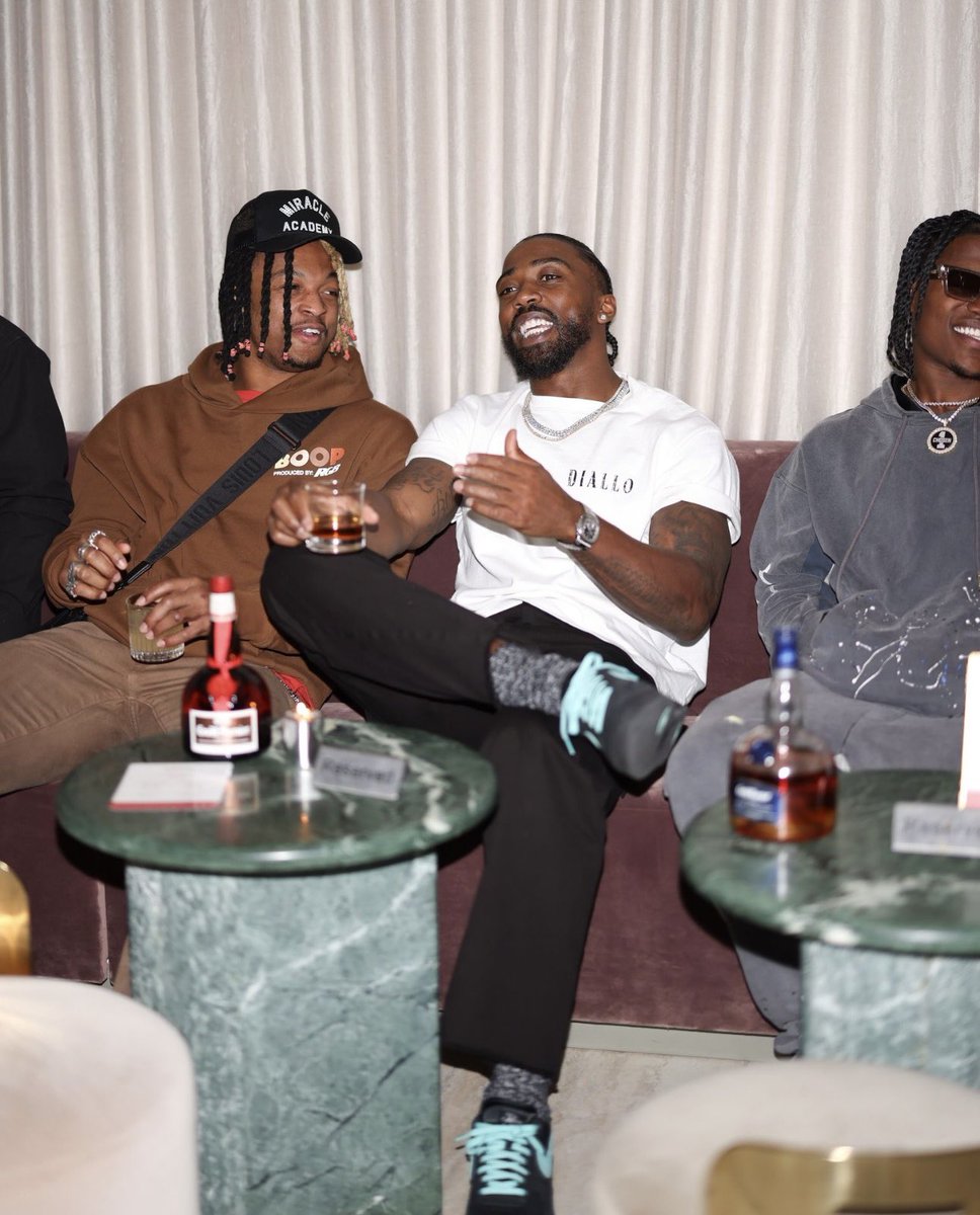 TyrodTaylor's tweet photo. A special night deserves a special toast! No better way to cap off such an awesome weekend celebrating the launch of #WelcomeToDIALLO then vibes with my friends @GrandMarnierUSA . #Ad 21+. 🪶 https://t.co/q0Mpb5UIsG