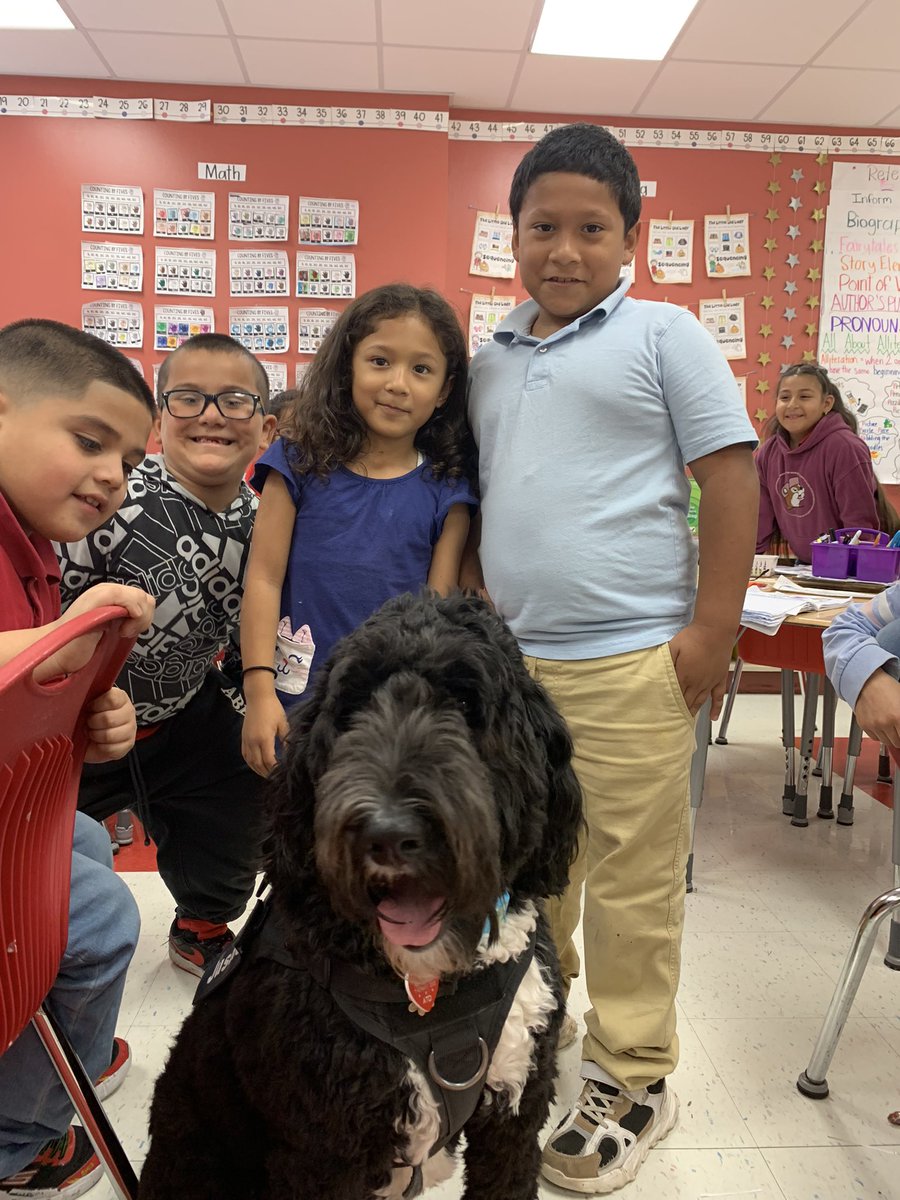 HISDPAWS's tweet photo. What can I say! It’s just a boy and his dog. Justice made her weekly visit to @ShermanES1 to see one of her favorite kiddos. He looks forward to his weekly Justice walk. @HISDPDChief @HISDPolice #makingkidshappy https://t.co/HOFofWUZAK