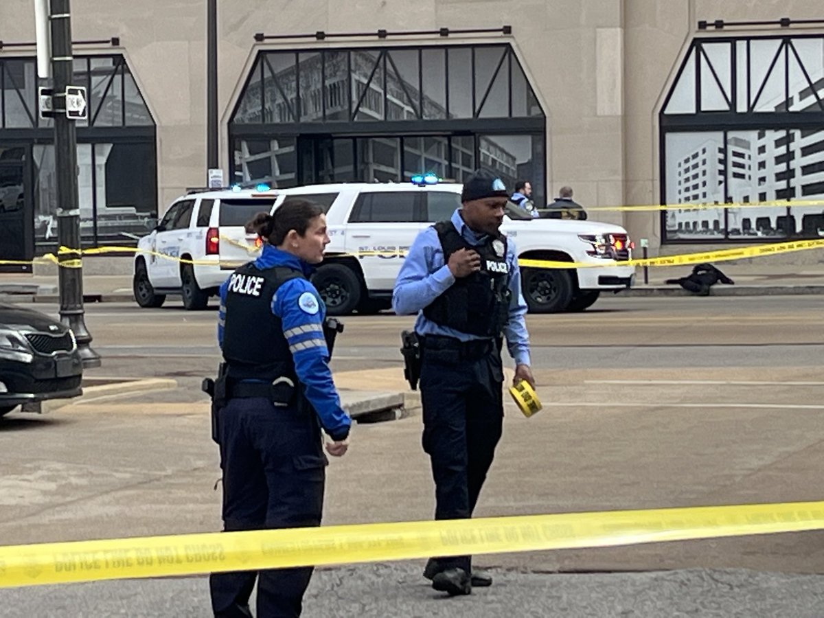 Aftermath of shooting, when I arrived around 10:30 Monday morning, as seen from across north Tucker at Shell station. Victim in same dark clothing as video dead on the sidewalk.