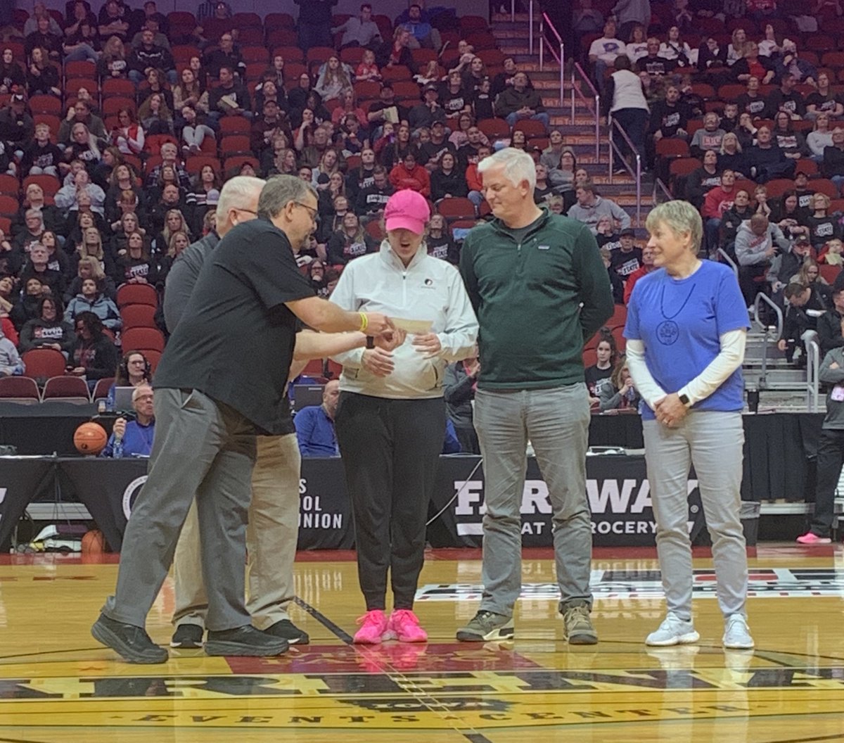 IGCAcoach's tweet photo. Tonight the IGCA was THRILLED to help the family of the IGHSAU's Lisa Brinkmeyer, the ultimate Iowa Girl. Pictured are Joy Gross, Rick Dillinger and Joel Sullivan presenting Lisa and her husband Ted with a check from the proceeds of this year's SB clinic to help the family. https://t.co/9MtpXyEIiB