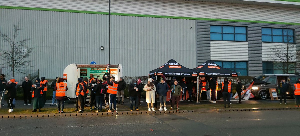 The picket line is bigger than last month and morale and confidence remains high. @GMBStuart tells me I've just witnessed the first victory of the day with a truck turning around after being approached by Amazon workers.