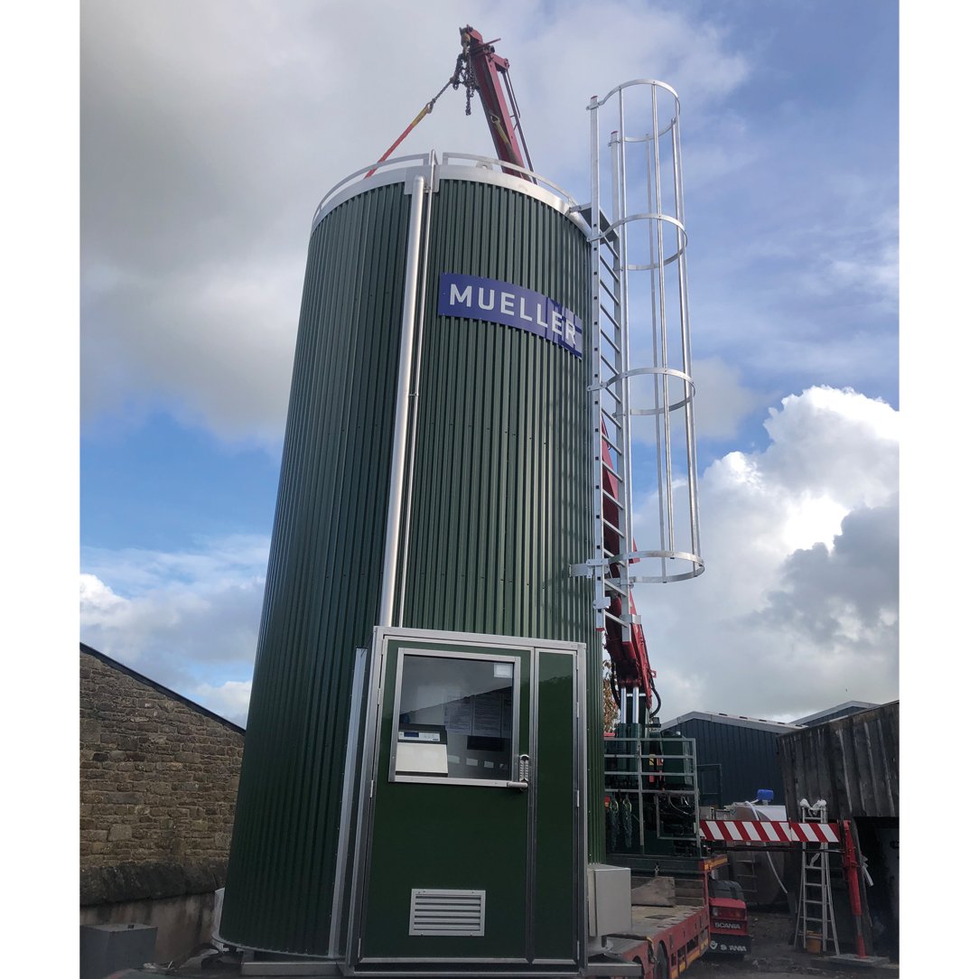 MuellerCompany's tweet photo. This green Mueller 30,000 liters Milk Silo with a lockable alcove was installed in Lancashire by @DDCooling, one of our dealers in the UK.
More high-quality, vertical milk silos: https://t.co/qsDpW9aiSR

#MilkSilo #MilkCoolingTanks #MilkTower #Mueller https://t.co/kKeNvRy9eQ