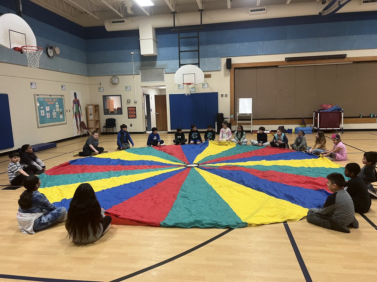 Morning Meeting fun with <a href="/TheDalePE/">Kenan Brod (She/Her)</a> 🪂. We love starting the day moving our bodies together!