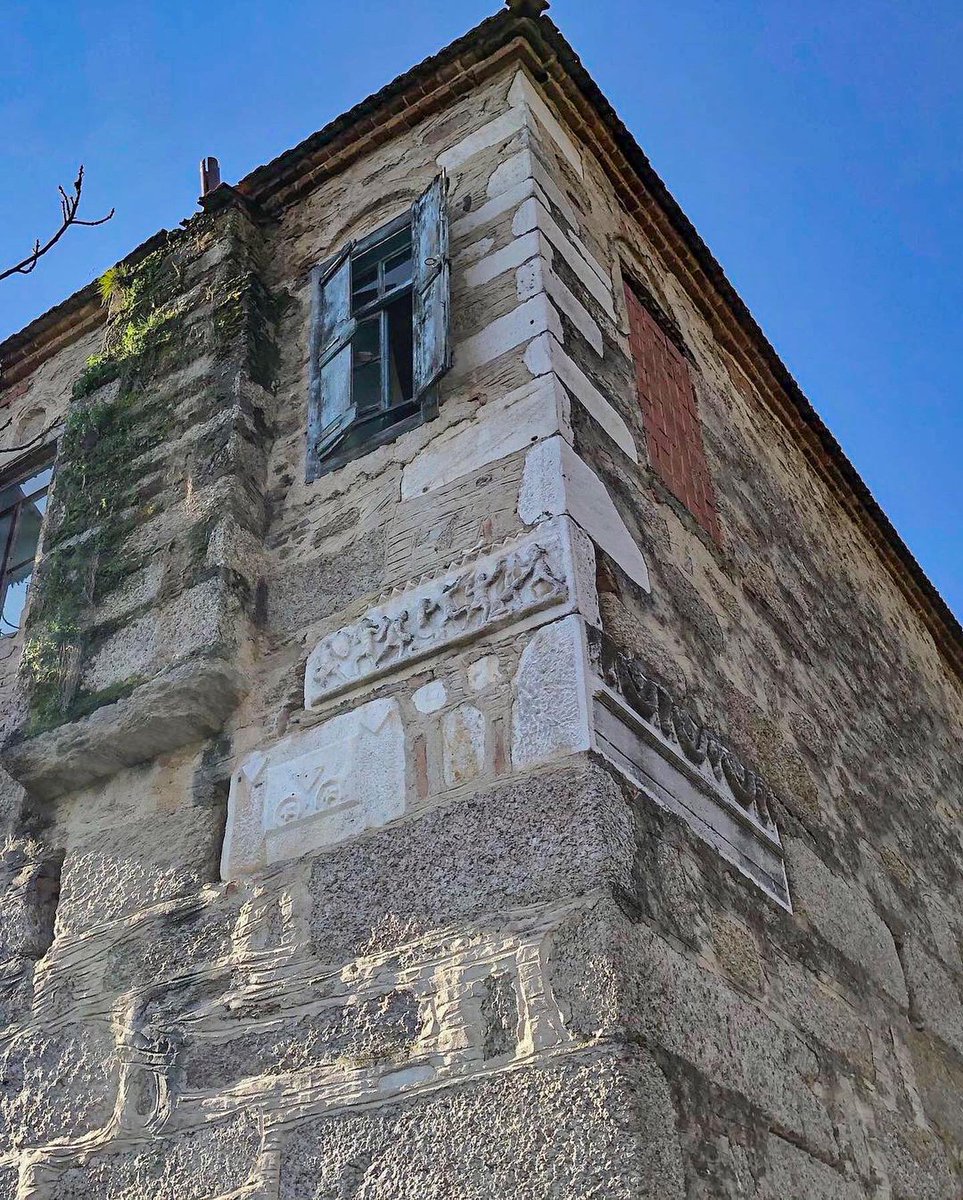 A house created by using materials from an ancient building somewhere in the Aegean coast of Turkey. This technique is known as spolia and it was really popular in Mediterranean countries including Greece & Italy before the advent of modern archeology!