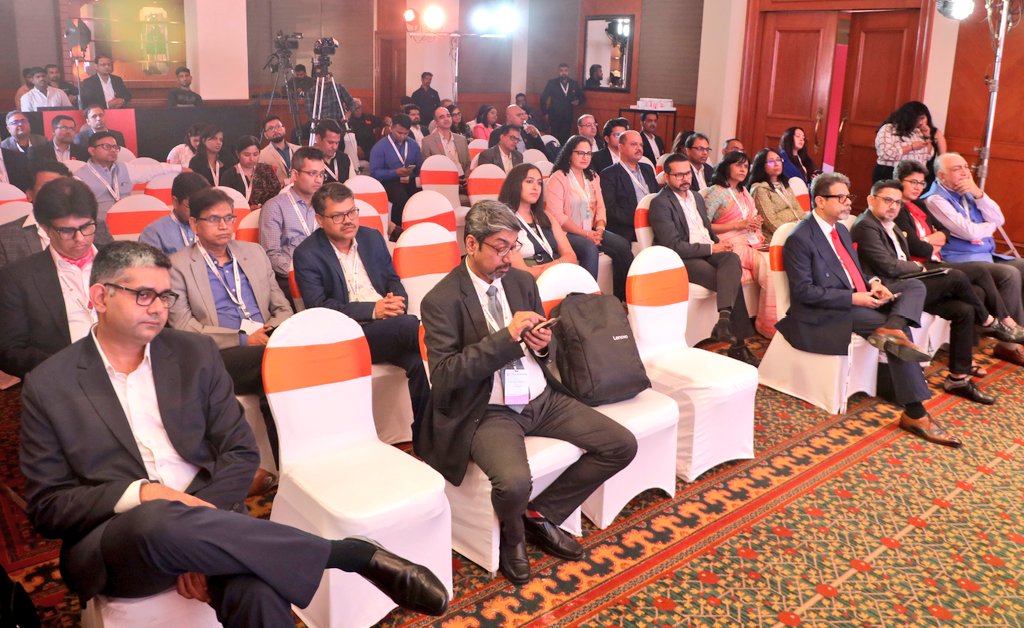 The photographer caught me live tweeting in these pics from #CSODConnect in Mumbai. You can spot @nishchae in the first pic and @IndianYash in the second :)