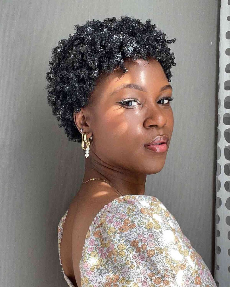 Sexy natural tight curls-
 
Embrace your kinks with this amazing style. 
The key is keeping your hair moisturized at all times. 
A daily comb out with moisturizer will have you turning heads all day long. 

#kinkycurls #kinkyhair #curlyhair #naturalcurls