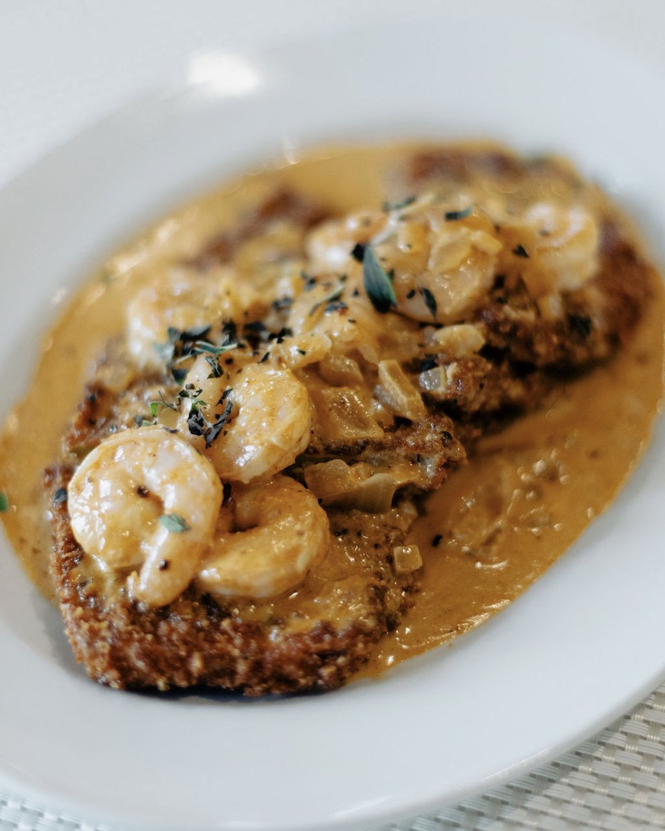Crispy eggplant + sautéed shrimp in a pool of Cajun cream sauce. The perfect shareable to enjoy together.